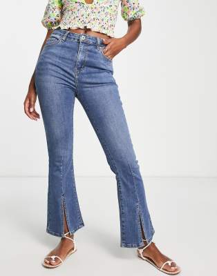 Urban Revivo flare jeans with front split in mid blue - ASOS Price Checker