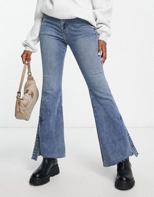 Urban Revivo flare jeans with split hem detail in blue - ASOS Price Checker