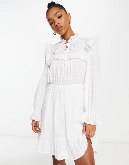 Urban Revivo frill shoulder high neck mini dress in off white