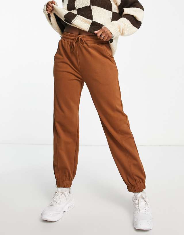 Urban Revivo jogging pants in brown