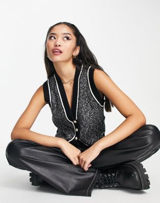Urban Revivo knitted pearl button front vest in black glitter