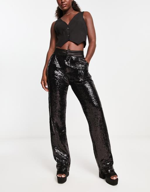 Urban Revivo - Pantaloni a vita alta a zampa neri con paillettes