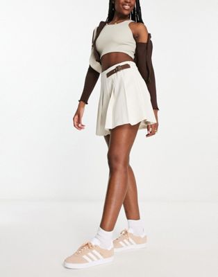 Urban Revivo pleat mini skirt with buckle detail in off white