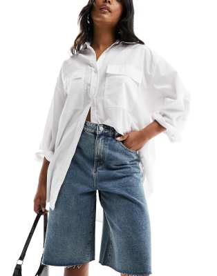 Urban Revivo Urban Revivo raw edge longline shorts in mid blue