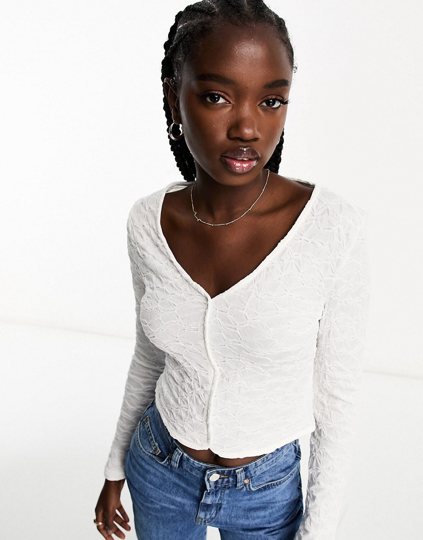 textured button-up top on ivory-White