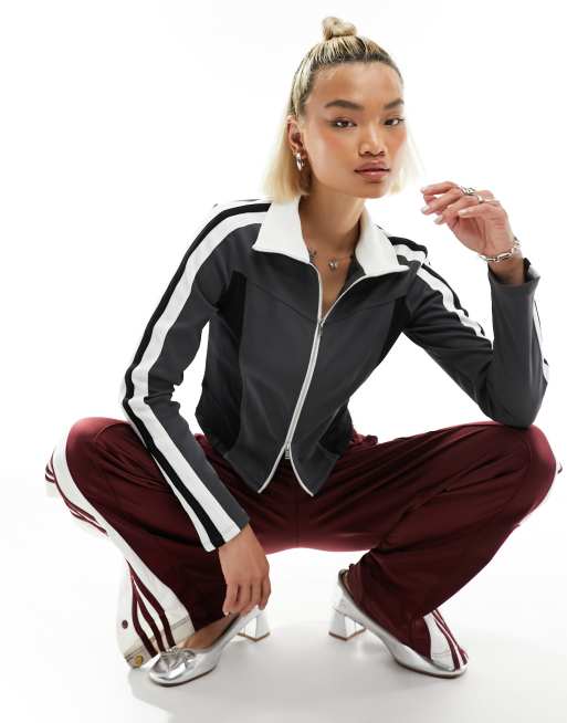 Urban Revivo - Top aderente a maniche lunghe con finiture a contrasto e zip