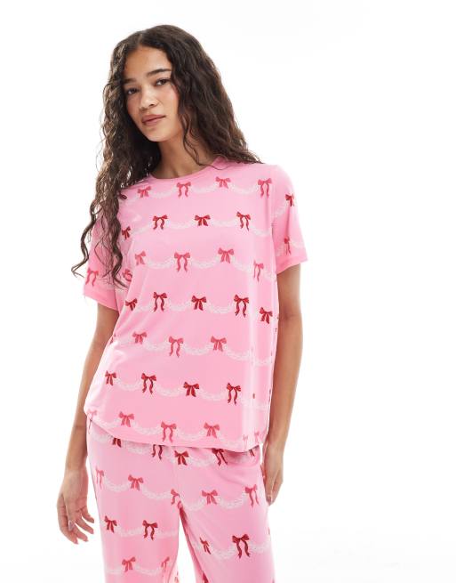Urban Threads Christmas short sleeve revere and trouser pyjama set in festive bow print, 4 of 4