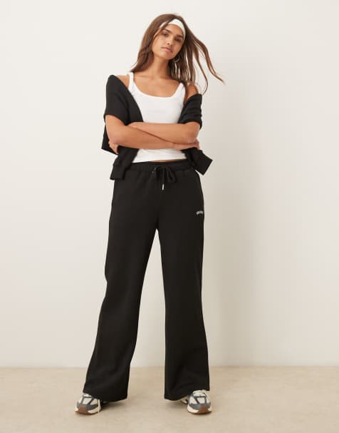 Urban Threads – Czarne joggersy dresowe z szerokimi nogawkami w sportowym stylu - view 1