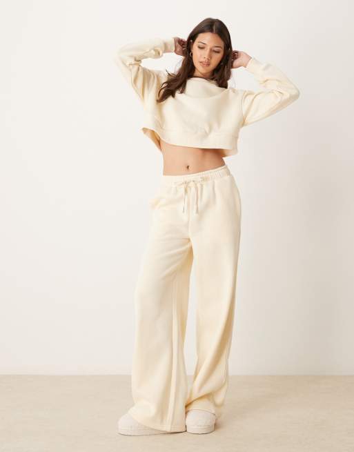Urban Threads - Joggers a fondo ampio da casa sportivi color crema