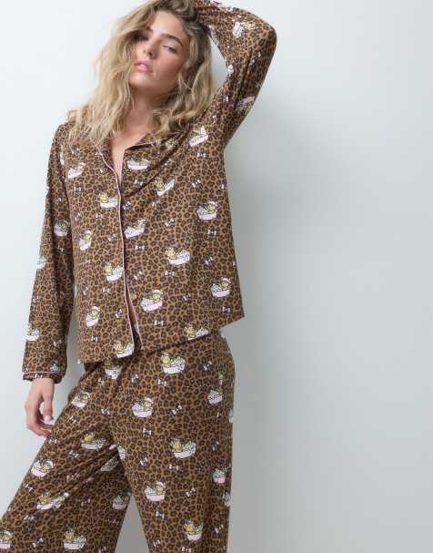 Urban Threads long sleeve button up shirt and trousers pyjama set in leopard teddy in bath print - view 1
