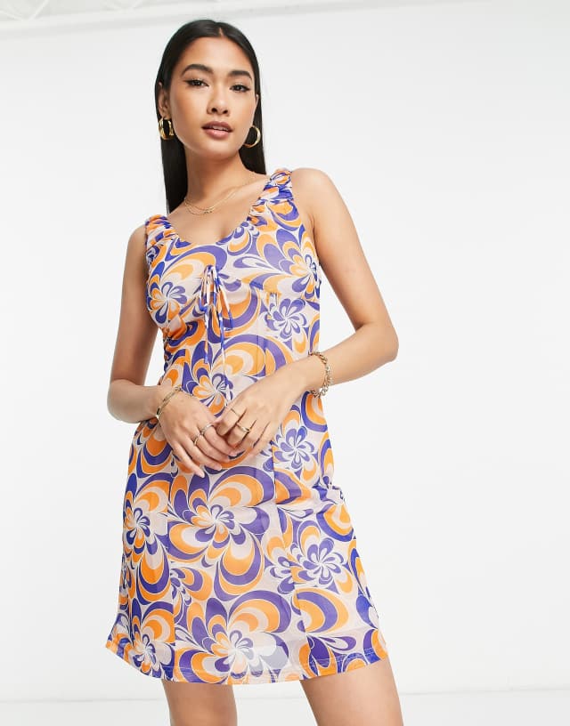 Urban Threads mesh mini dress in swirl print