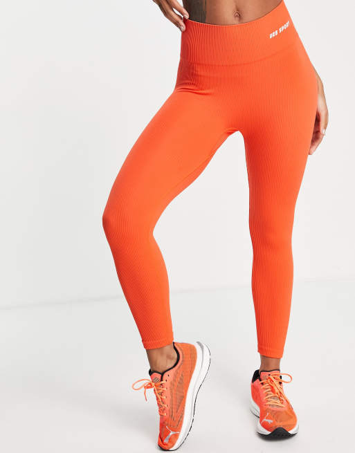 Urban Threads – Orange träningsleggings i seamless-design