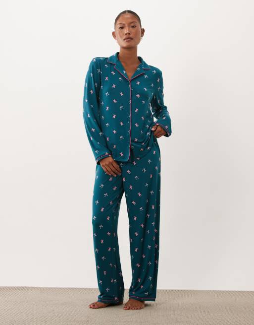 Urban Threads Petite long sleeve button up shirt and trousers pyjama set in teal bow print, 2 of 4