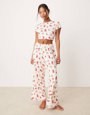 Urban Threads Urban Threads Petite poly t-shirt and trouser pyjama set in cowboy boot print-Multi