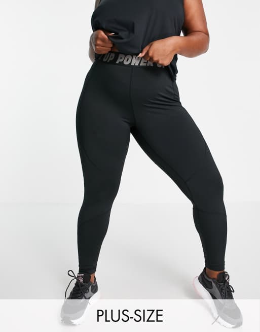 Urban Threads Plus - Fitnesslegging met tekst op de tailleband in zwart
