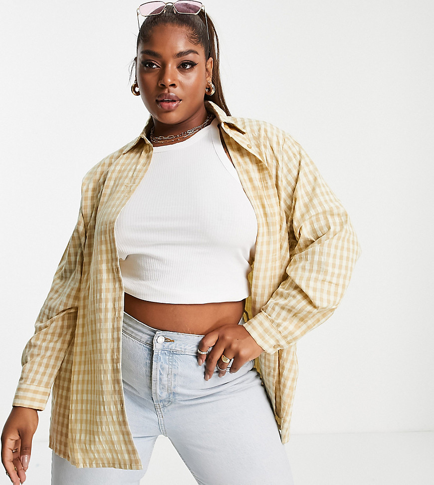 Plus-size shirt by Urban Threads Check you out Spread collar Button placket Drop shoulders Oversized fit