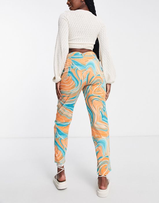 https://images.asos-media.com/products/urban-threads-tailored-pants-in-swirl-print/201802547-2?$n_550w$&wid=550&fit=constrain