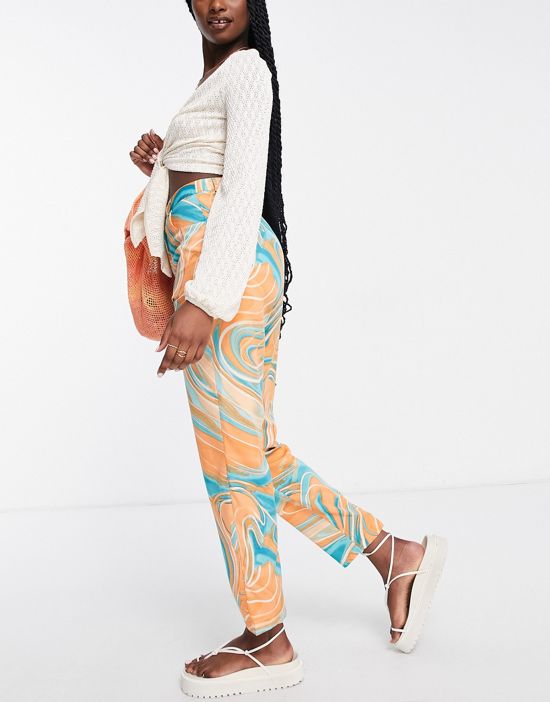 https://images.asos-media.com/products/urban-threads-tailored-pants-in-swirl-print/201802547-4?$n_550w$&wid=550&fit=constrain