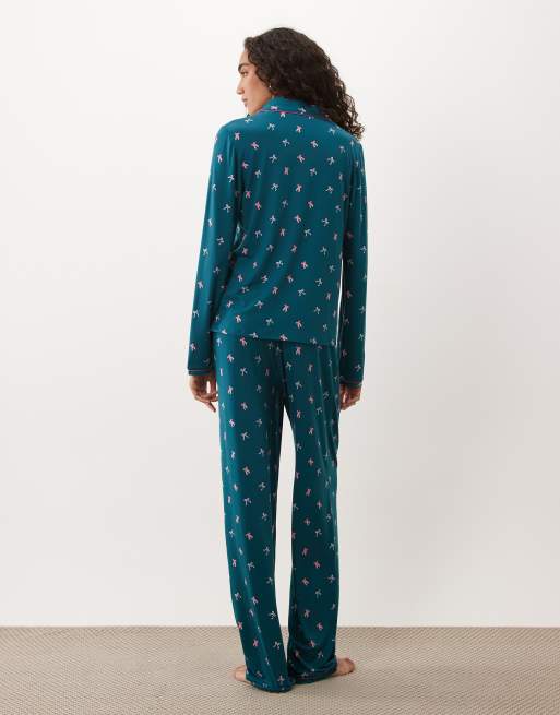 Urban Threads Tall long sleeve button up shirt and pants pyjama set in teal bow print, 2 of 4