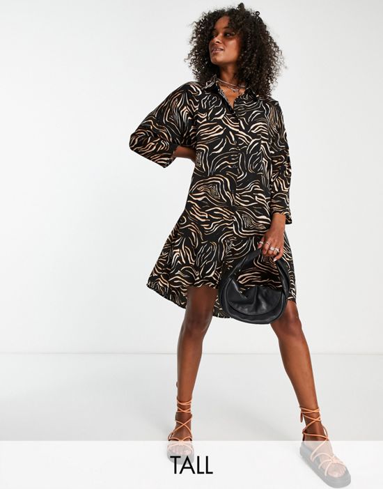 https://images.asos-media.com/products/urban-threads-tall-oversized-shirt-dress-in-abstract-animal/202483802-1-multi?$n_550w$&wid=550&fit=constrain