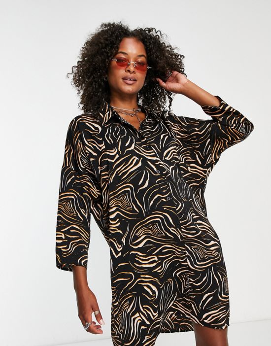 https://images.asos-media.com/products/urban-threads-tall-oversized-shirt-dress-in-abstract-animal/202483802-3?$n_550w$&wid=550&fit=constrain