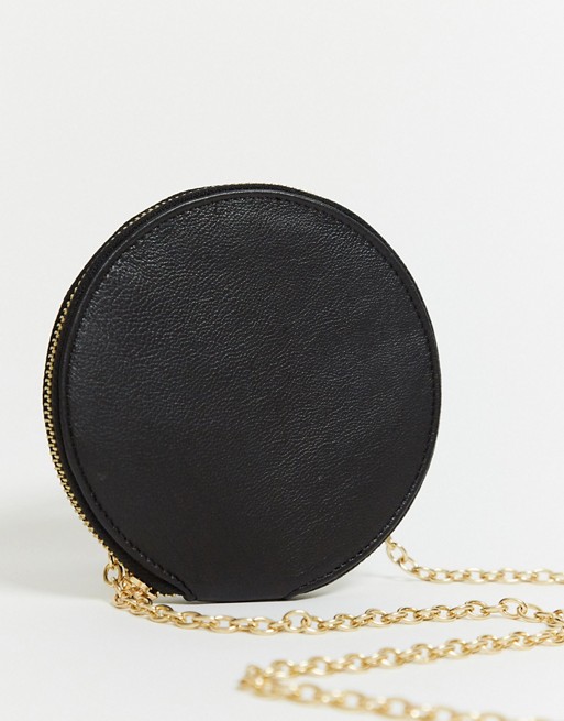 Urbancode circular cross body purse bag in black suede | ASOS
