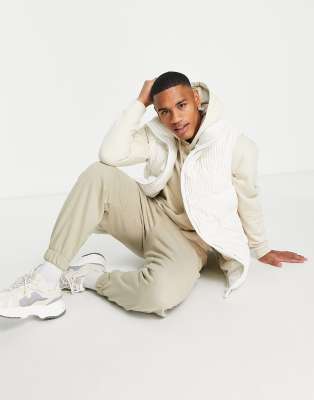 cream puffy vest