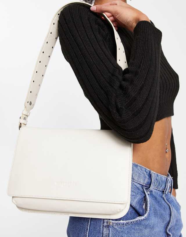 Urbancode leather flapover shoulder bag with studded strap in cream