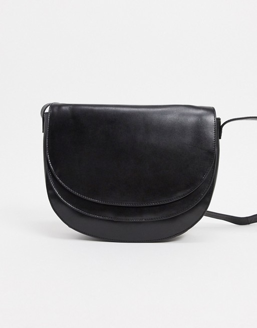 Urbancode leather saddle cross body bag with double flap in black