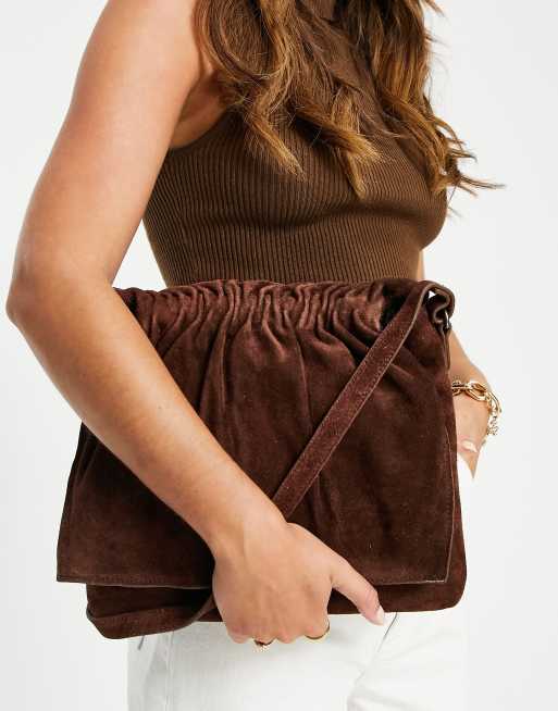 Urbancode leather suede drawstring crossbody bag in brown ASOS