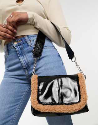 Urbancode patent shoulder bag with borg trim in black | ASOS