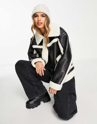 Urbancode PU aviator jacket in black with contrast cream borg trims | ASOS