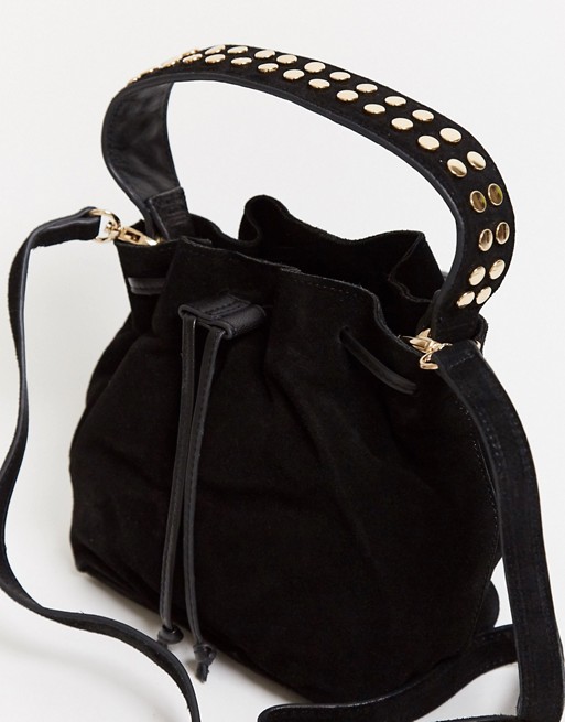 Urbancode suede bucket bag with studded handles in black | ASOS