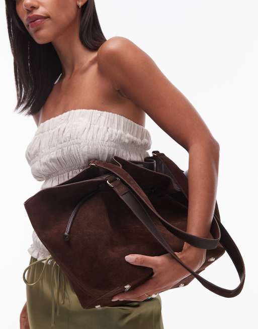 4534 Urbancode – Zamszowa torebka bucket w kolorze gorzkiej