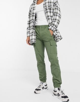 фото Узкие брюки карго из ткани рипстоп с затягивающимися манжетами с фиксатором в цвете хаки asos design-зеленый