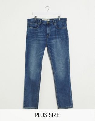 фото Узкие синие джинсы с рваной отделкой new look plus-синий