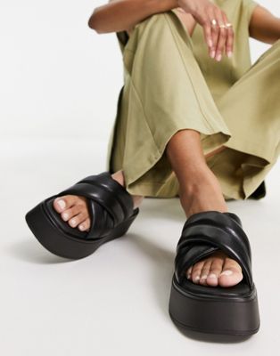 Vagabond Courtney crossover flatform sandals in black leather