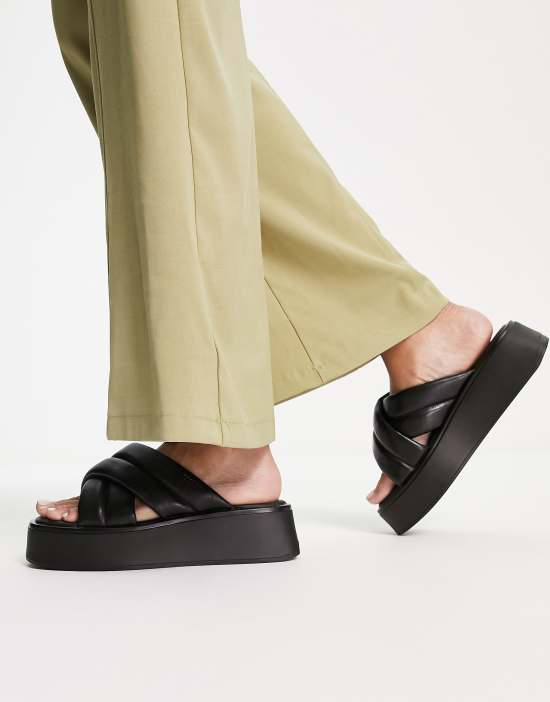 https://images.asos-media.com/products/vagabond-courtney-crossover-flatform-sandals-in-black-leather/201987478-4?$n_550w$&wid=550&fit=constrain