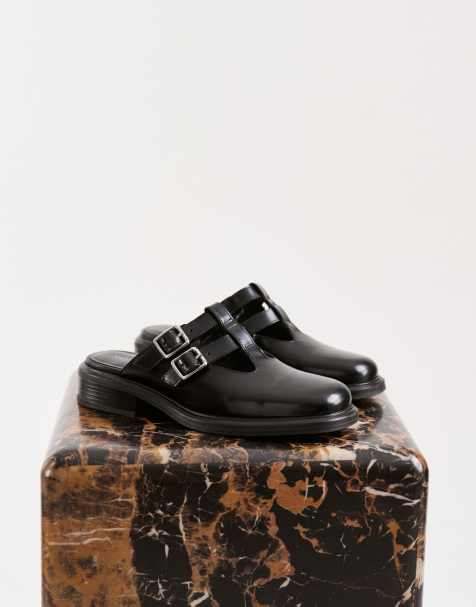 Vagabond Ellis leather slip on mules in black - view 1