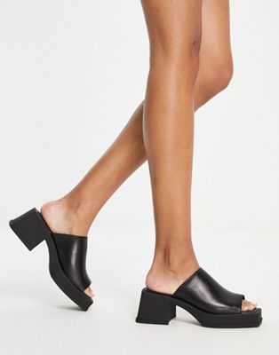 Vagabond Hennie chunky heeled mules in black leather