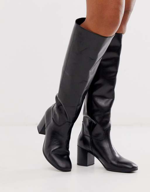 Bottes noires store hauteur genoux