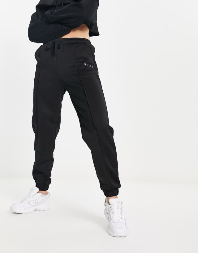 VAI21 cuffed sweatpants with seam in black - part of a set