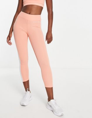 VAI21 - Lange Leggings in Orange mit Zierstreifen, Kombiteil