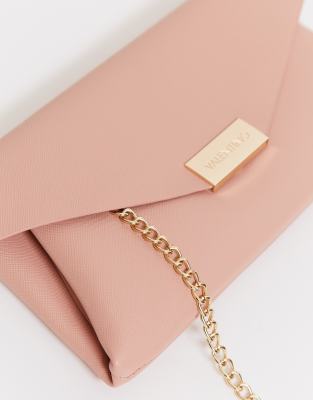 pink purse with chain strap