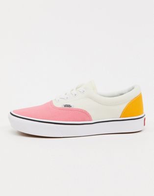 pink and white shoe vans