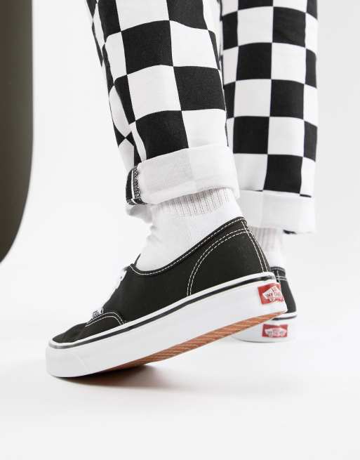 Vans authentic checkerboard store plimsolls in black