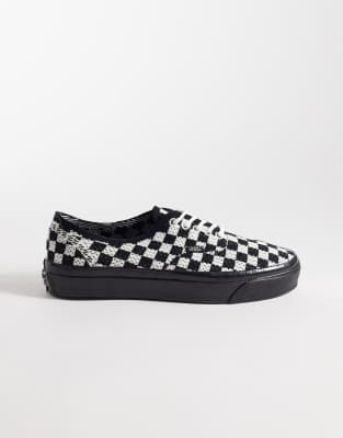  Authentic trainers  and white checkerboard with black sole 