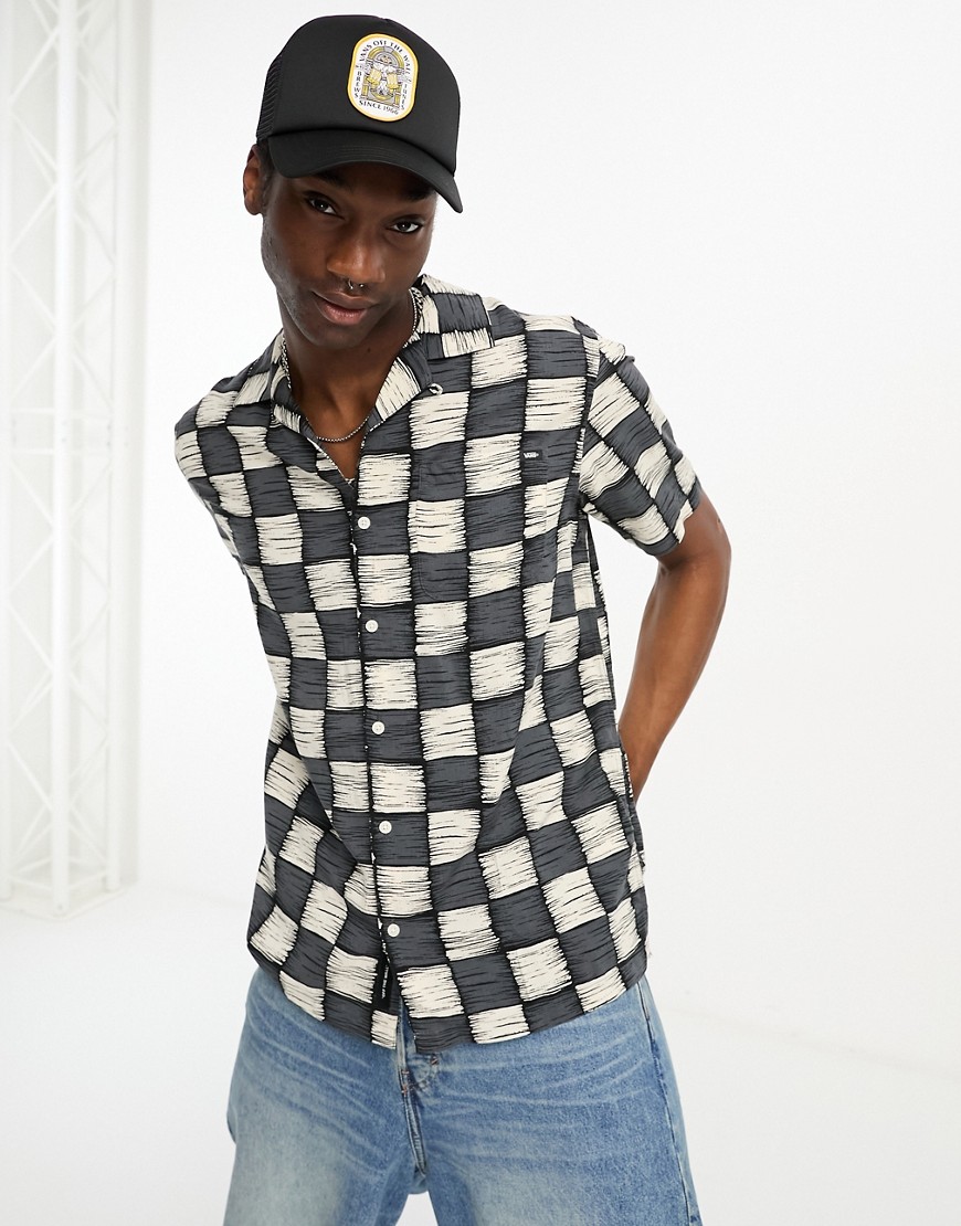 VANS CHECKERBOARD PRINT SHORT SLEEVE SHIRT IN BLACK AND WHITE