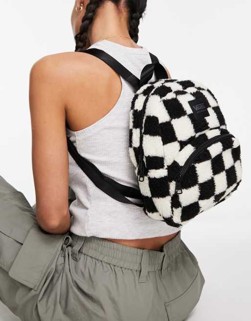 Vans checkered print furry backpack in black and white