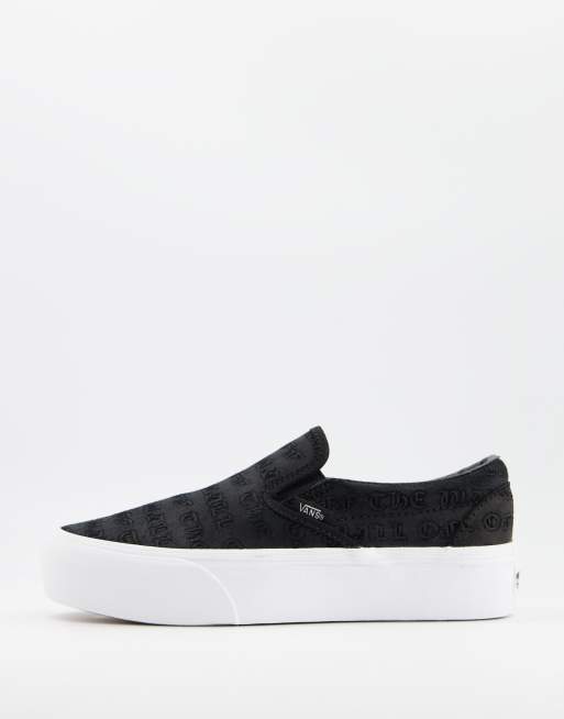 vans slip on platform black